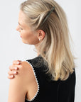Womens Silver, long, French Barrette styling side-swept, blonde, straight hair. Hair accessory by France Luxe.