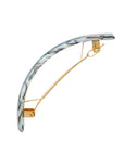 Side view of a light blue France Luxe large barrette, with a spacious clasp for thick hair.