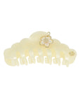 Hair clip with a decorative flower on a white background