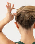 L. Erickson Beige, no damage hair ties, styling light brown, straight, ponytail.