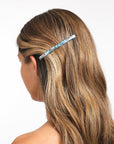 Womens Light Blue French Barrette styling side-swept, light brown, straight hair. Hair accessory by France Luxe.