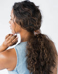 Womens brown, large Barrette, ideal for thick hair, seen styling pulled back, brown, curly hair.