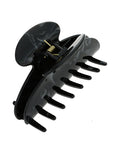 Large hair clip with strong spring clasp & smooth cellulose acetate teeth for a secure hold in thick or curly hair.