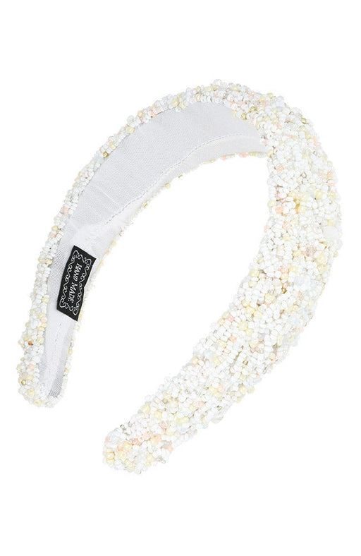Extra wide headband covered in white beads by L. Erickson