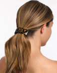 Womens classic tortoiseshell, large Barrette, ideal for thick hair, seen styling pulled back, blonde, straight hair.