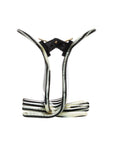 Side view of a black & white France Luxe large claw hair clip, ideal for thick or curly hair.