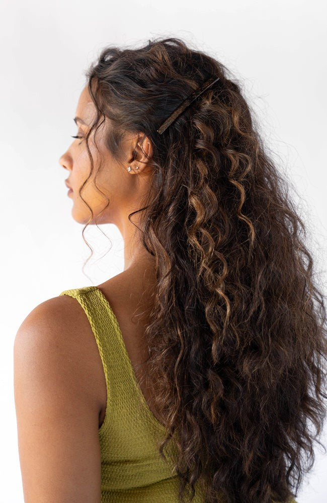 Womens Metallic Brown, long, French Barrette styling side-swept, brown, curly hair. Hair accessory by France Luxe.