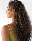 Womens Metallic Brown, long, French Barrette styling side-swept, brown, curly hair. Hair accessory by France Luxe.