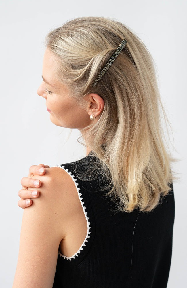 Womens Silver, long, French Barrette styling side-swept, blonde, straight hair. Hair accessory by France Luxe.