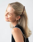 Womens Tortoiseshell, long, French Barrette styling side-swept, blonde, straight hair. Hair accessory by France Luxe.