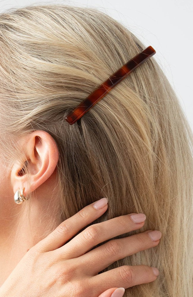 Womens Tortoiseshell, long, French Barrette styling side-swept, blonde, straight hair. Hair accessory by France Luxe.