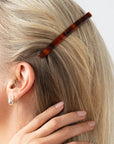 Womens Tortoiseshell, long, French Barrette styling side-swept, blonde, straight hair. Hair accessory by France Luxe.