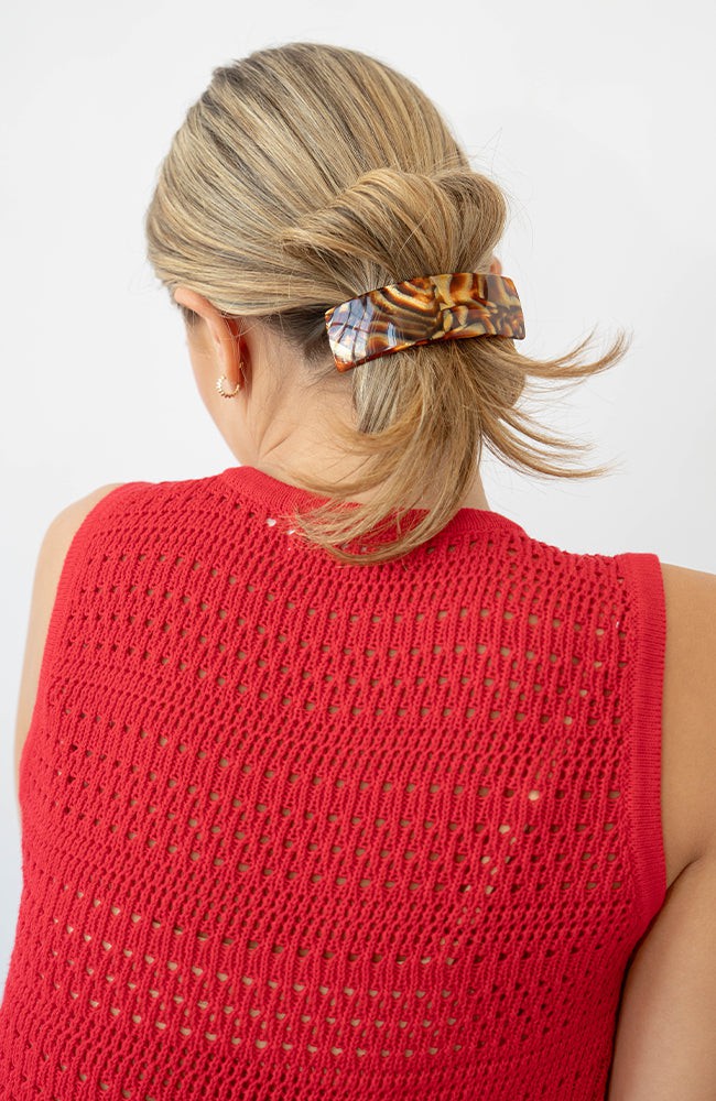 France Luxe Brown Large Barrette holding straight, blonde hair back in a loose twist.