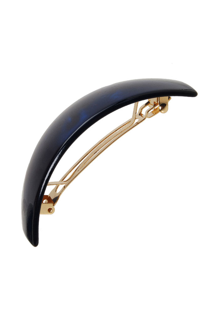 Side view of a navy blue France Luxe large barrette, with a spacious clasp for thick hair.