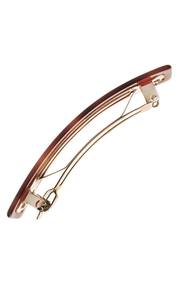 Side view of a tortoiseshell France Luxe Classic French Barrette, ideal for most hair types.