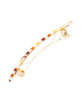 Side view of a checkered tortoise France Luxe Classic French Barrette, ideal for most hair types.