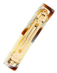 Medium French barrette in Natural Horn, ivory, caramel, and chestnut blend, ideal for most hair types.