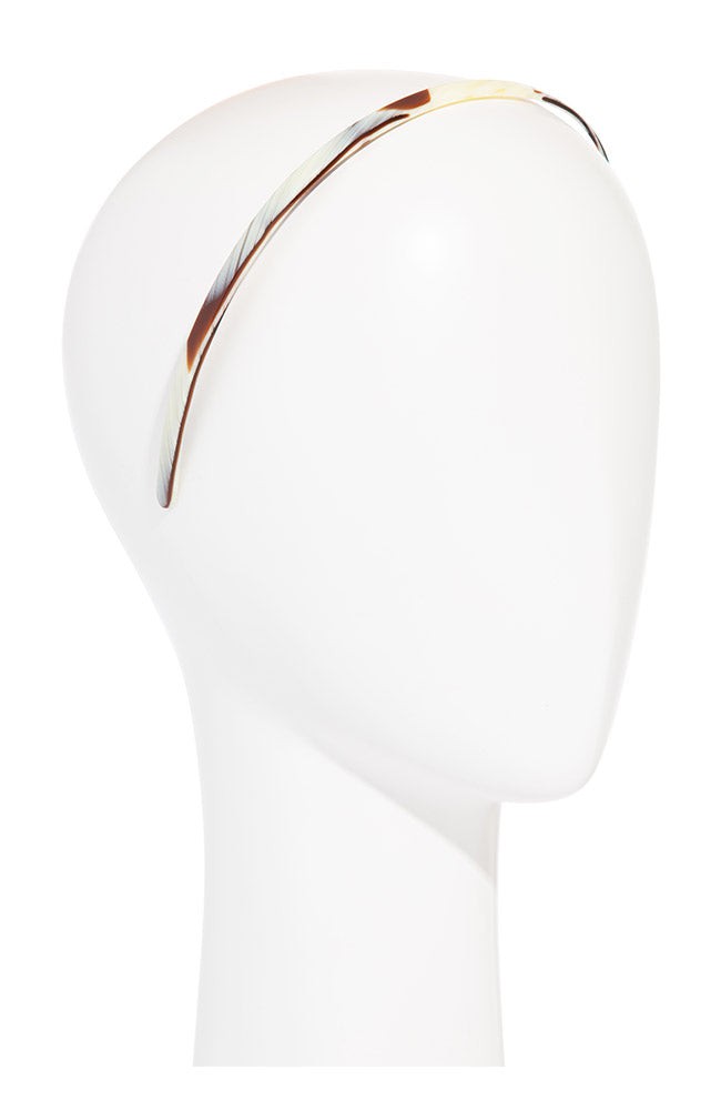 Thin no-slip 1/4" Ultracomfort Headband in Natural Horn with gentle teeth and ivory-caramel-brown tones.