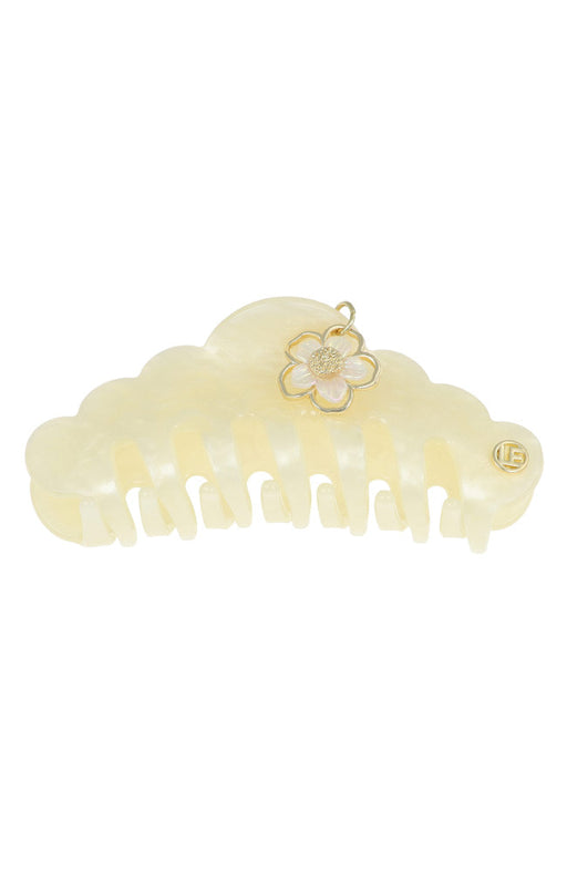 Hair clip with a decorative flower on a white background