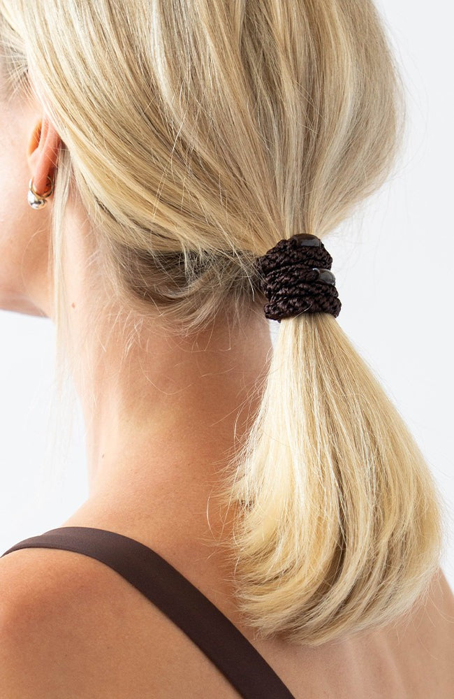 Brown hair ties styling a cute low ponytail, straight, blonde hair. L. Erickson Grab &amp; Go Pony, Camelback.