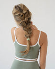 L. Erickson thick hair ties, styling light brown, straight, french braided ponytail. Light Green hair bands