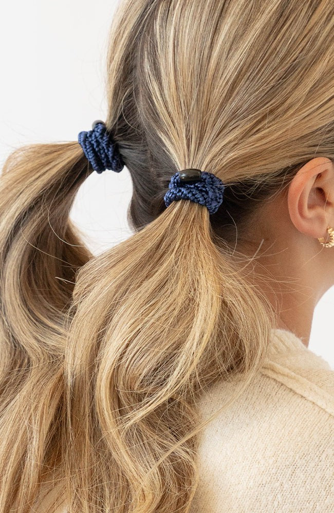 L. Erickson Blue, no damage hair ties, styling blonde, straight, pigtail ponytails.
