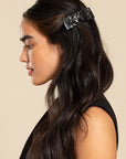 Womens Black, large, French Barrette styling side-swept, black, straight hair. Hair accessory by France Luxe.