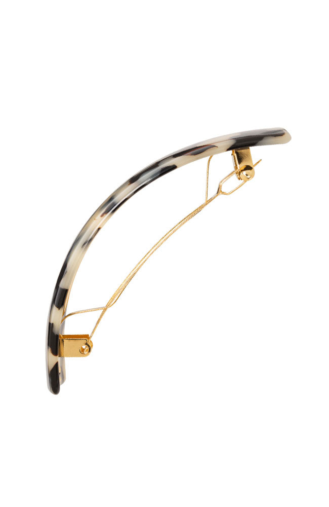 Side view of a ivory tortoiseshell France Luxe large barrette, with a spacious clasp for thick hair.