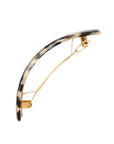 Side view of a ivory tortoiseshell France Luxe large barrette, with a spacious clasp for thick hair.