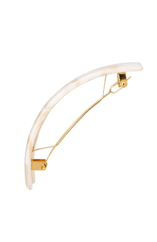 Side view of a white France Luxe large barrette, with a spacious clasp for thick hair.