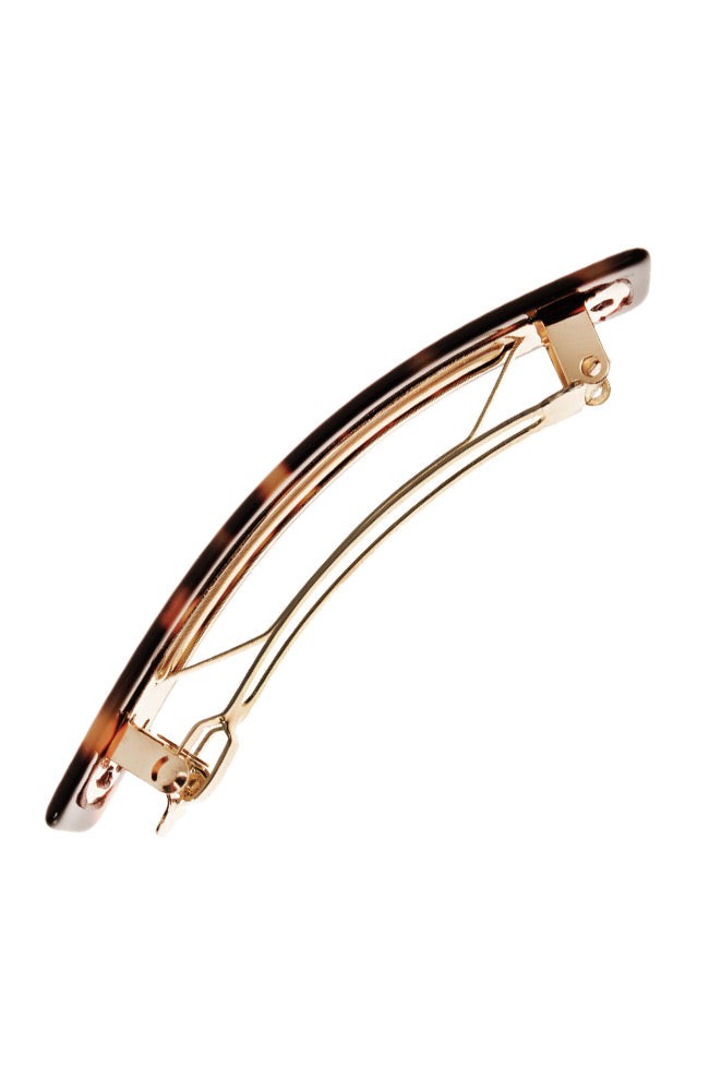 Side view of a classic tortoiseshell France Luxe Classic French Barrette, ideal for most hair types.