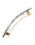 Side view of a light blue France Luxe Classic French Barrette, ideal for most hair types.
