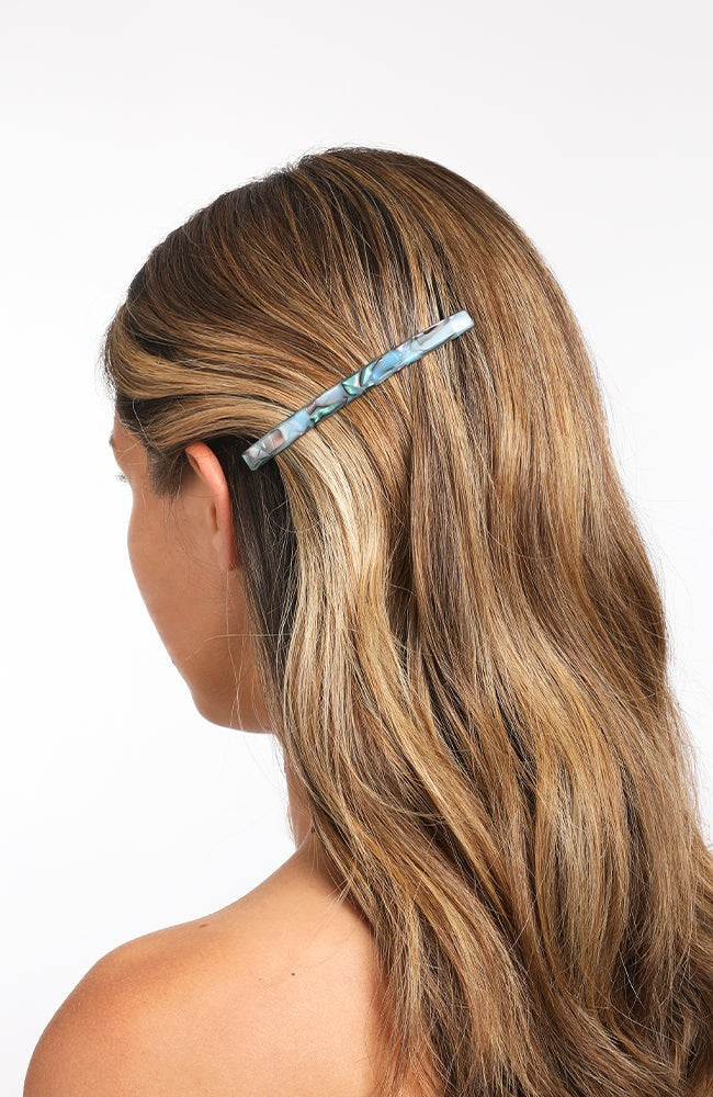 Womens Light Blue French Barrette styling side-swept, light brown, straight hair. Hair accessory by France Luxe.