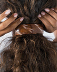 Womens large Barrette, ideal for thick hair, seen styling pulled back, brown, curly hair.