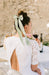 Sage green silk bow hair clip styling an elegant summer bun, Long Tail Bow Barrette, Silk Charmeuse Sage Green by L. Erickson USA, handmade in America