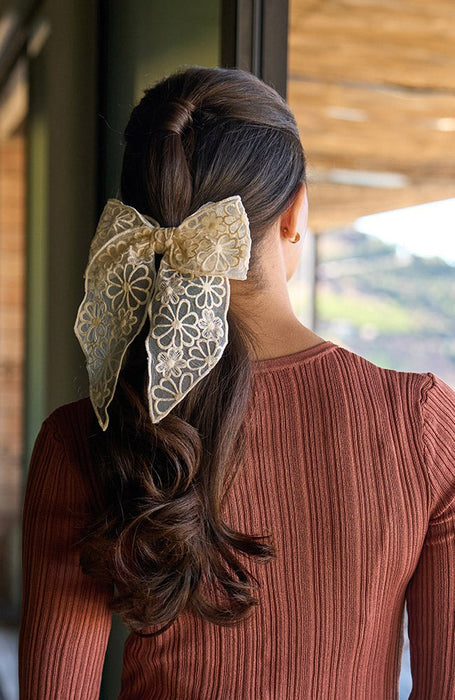 Cream floral lace bow hair clip styling an elegant embellished brown hair ponytail, Madelyn Bow Barrette by L. Erickson