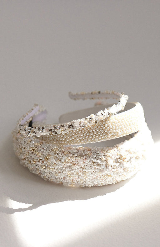 White, pearl headbands ideal for a bridal hairdo