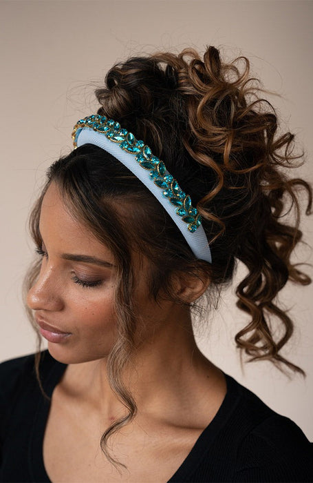 Padded crystal embellished wide headband crowning a loose updo with beautiful curly hair, Sapphire Bluebell Headband by L. Erickson