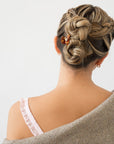 Woman with straight, blonde hair styled in a braided updo with a France Luxe mini, Brown claw hair clip.