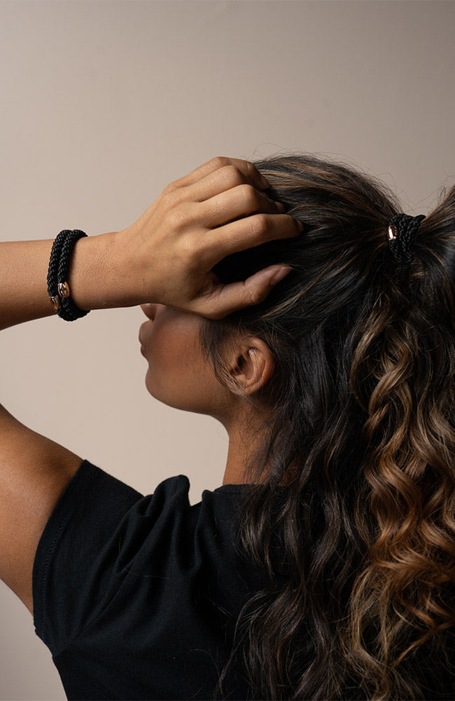 L. Erickson thick hair ties, styling dark brown, voluminous, curly , ponytail. Black & Rose Gold hair bands
