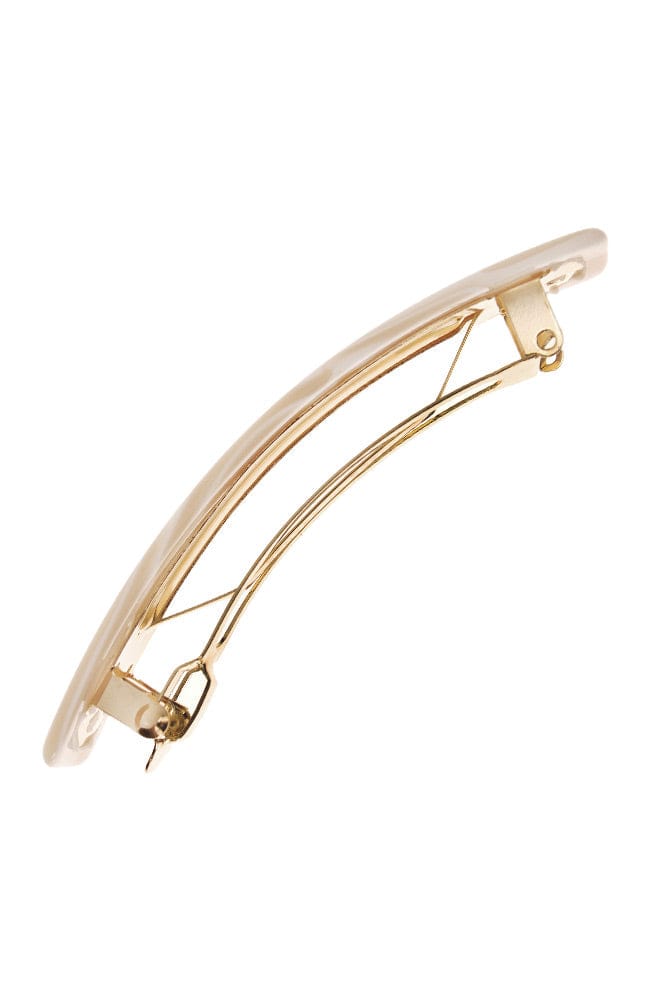 Side view of a white France Luxe Classic French Barrette, ideal for most hair types.