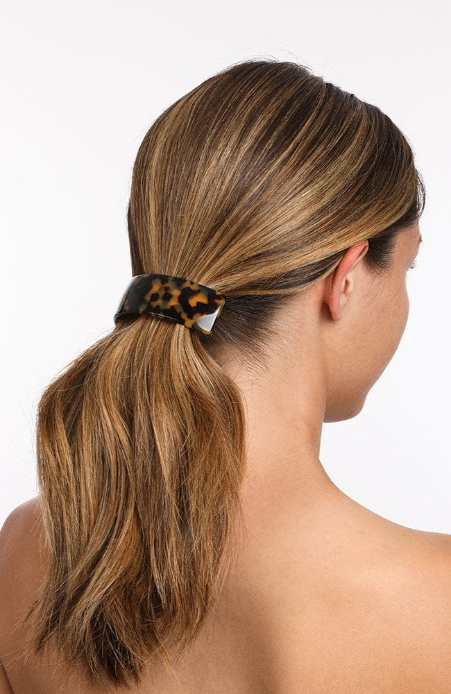 Womens classic tortoiseshell, large Barrette, ideal for thick hair, seen styling pulled back, blonde, straight hair.