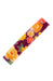 Red, Yellow and Orange flowers on purple background, with gold barrette