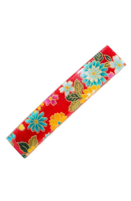 Floral and red acetate laminate on French barrette clip