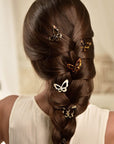 Butterfly hair clips styling a French braid, Butterfly Cutout Tige Boule Barrette by France Luxe, French hair clips