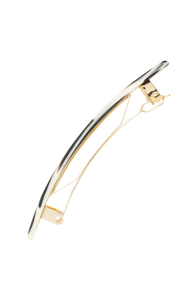 Side view of a black &amp; white France Luxe Classic French Barrette, ideal for most hair types.