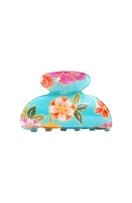 Little claw hair clip with floral and aqua blue acetate laminate and spring closure, by France Luxe, front view