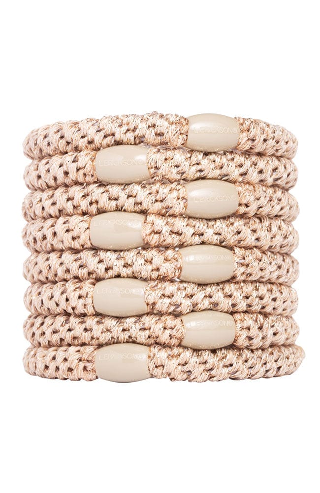 Metallic beige hair ties by L. Erickson.