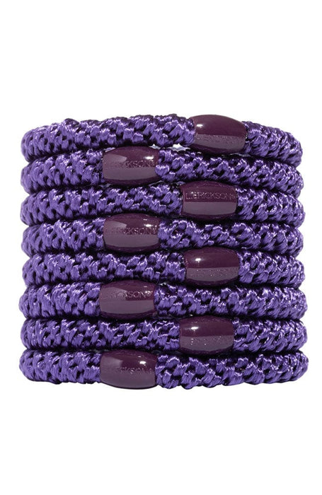 Thick, purple hair ties by L. Erickson.